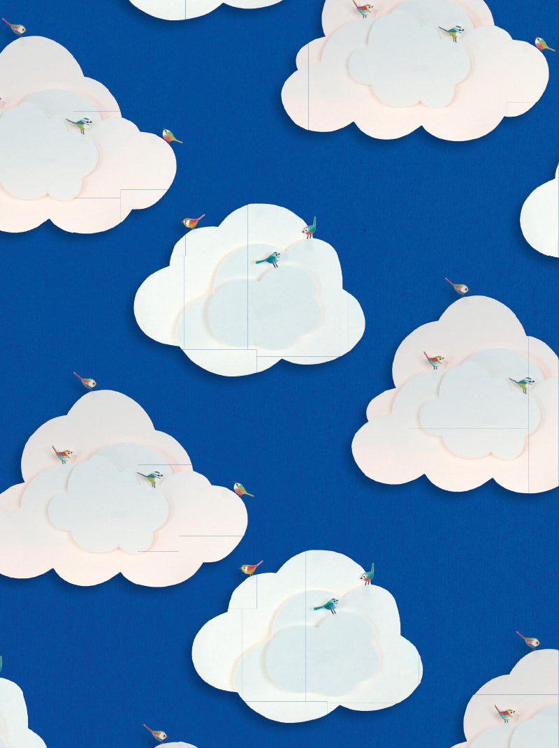 Pattern of white clouds with small birds on a blue background