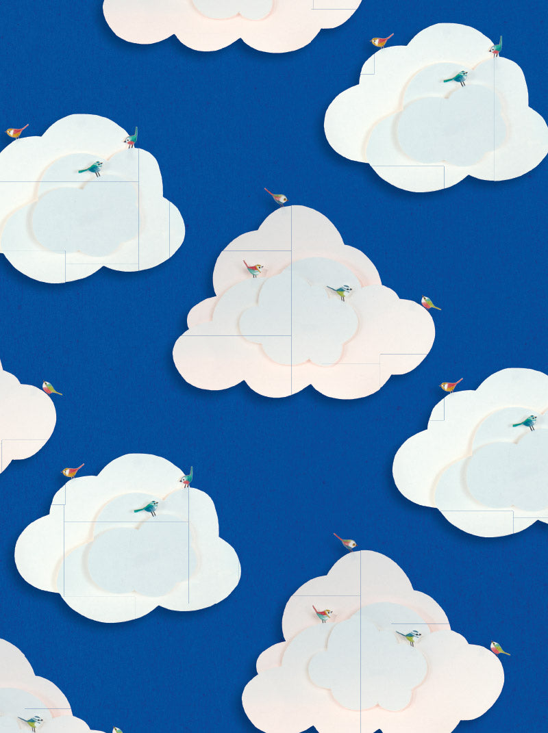 Pattern of white clouds with birds on a blue background