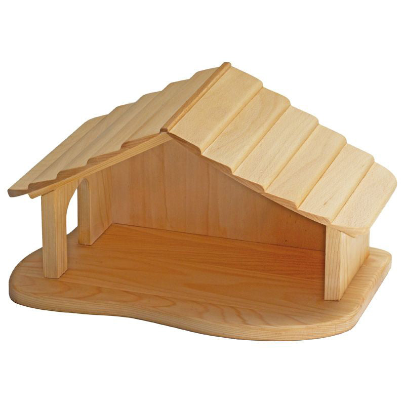 Gluckskafer wooden toy stable on white background.