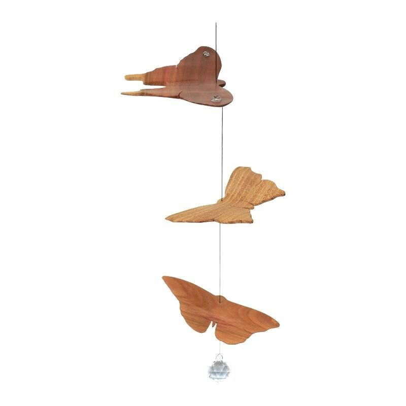 three butterflies with hanging crystal