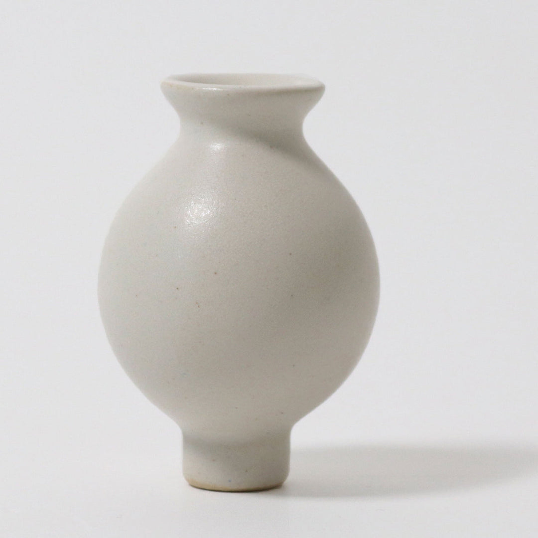 white vase for birthday ring