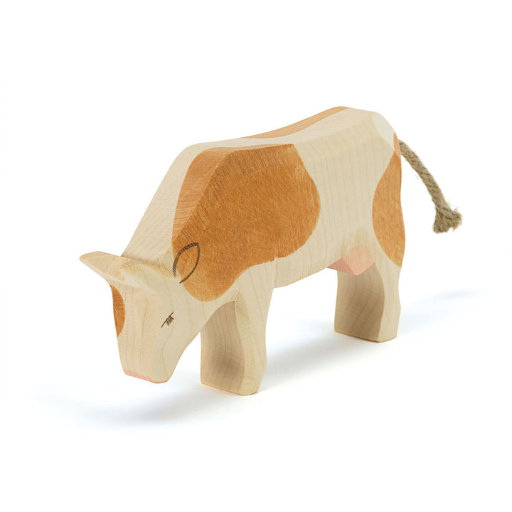 Ostheimer cow brown &amp; white, eating