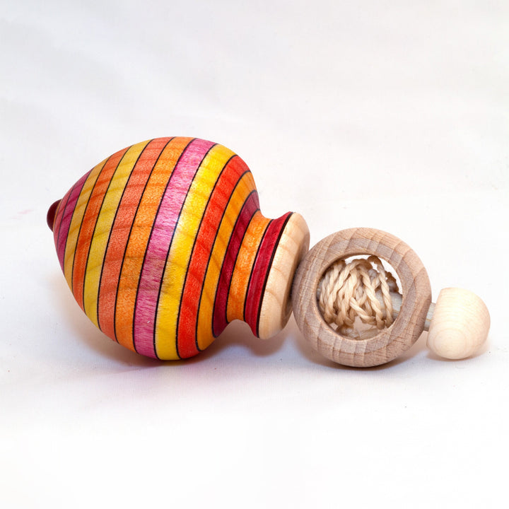 spinning top with retractable starter