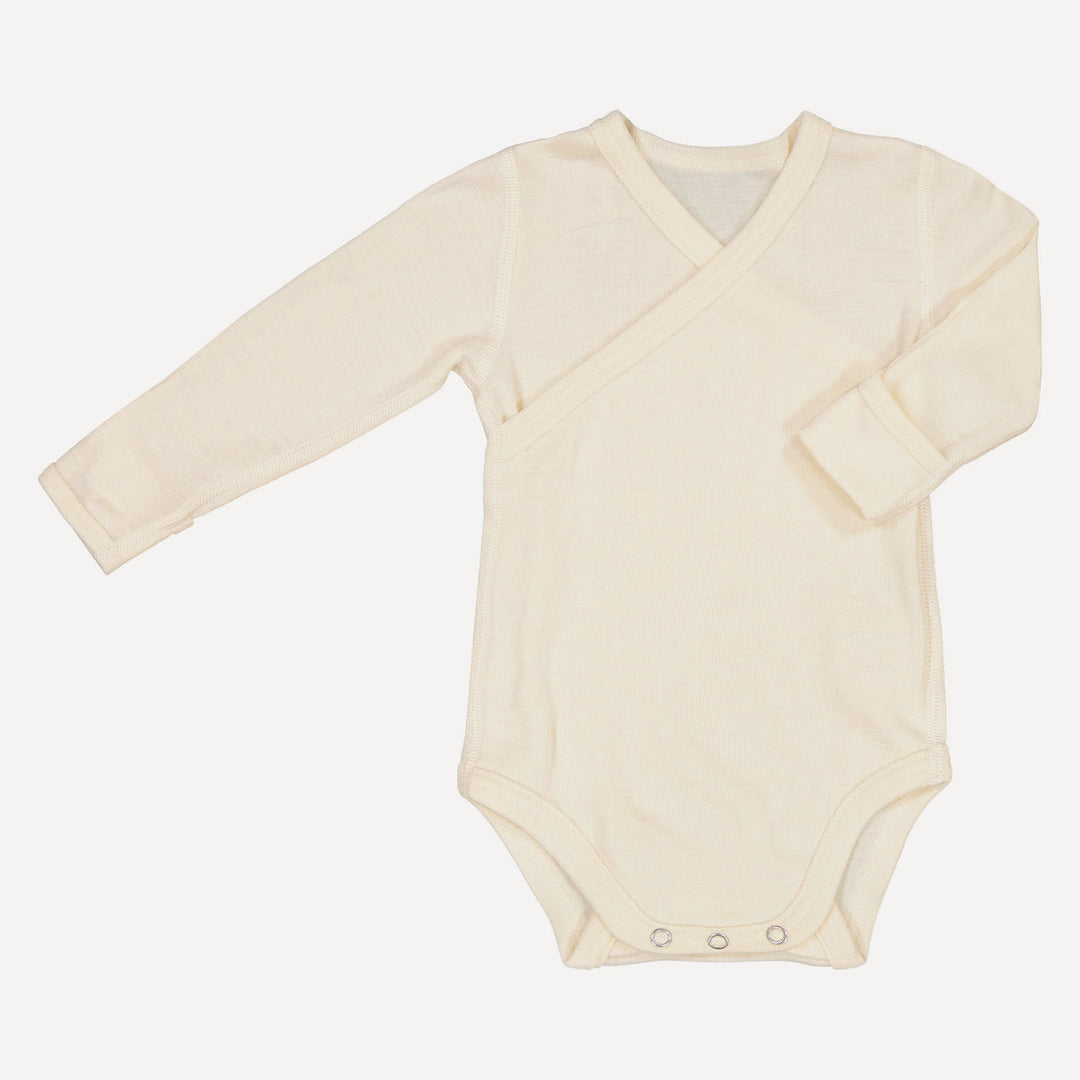 Organic silk and wool blend baby wrap bodysuit on a white background