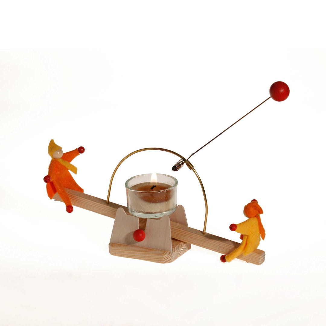 candle see-saw