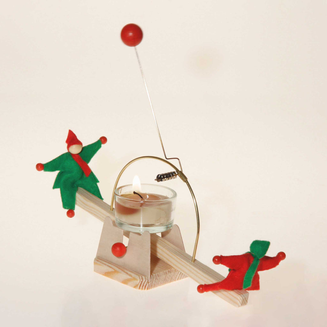candle see-saw