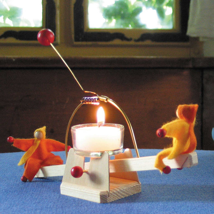 candle see-saw