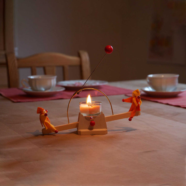 candle see-saw