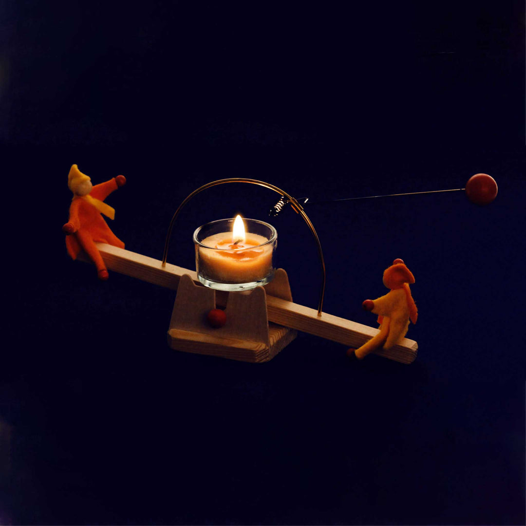 candle see-saw