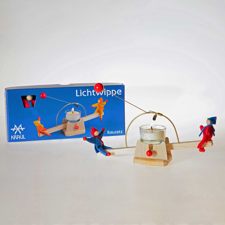 candle see-saw