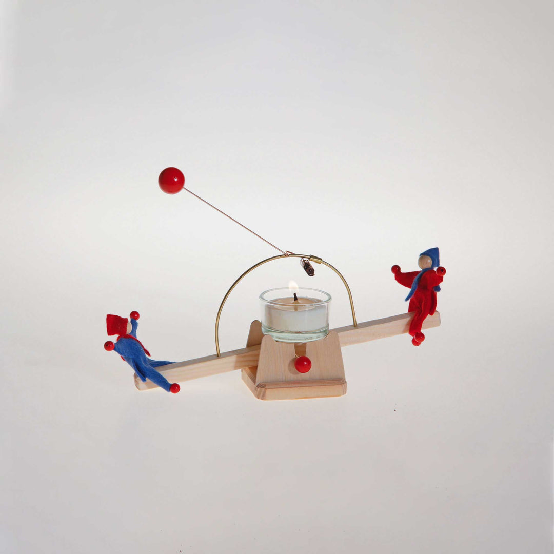 candle see-saw