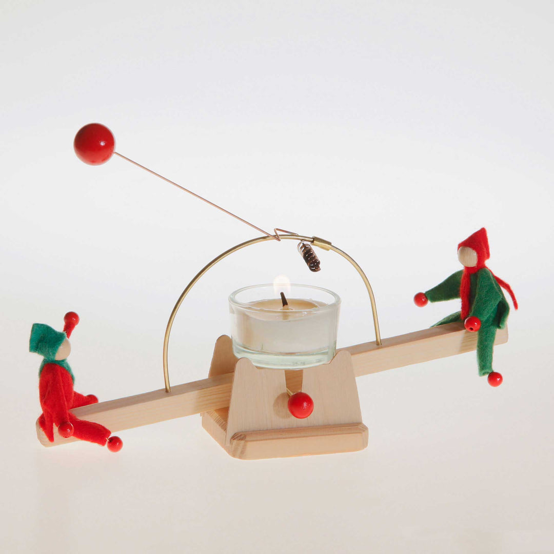 candle see-saw