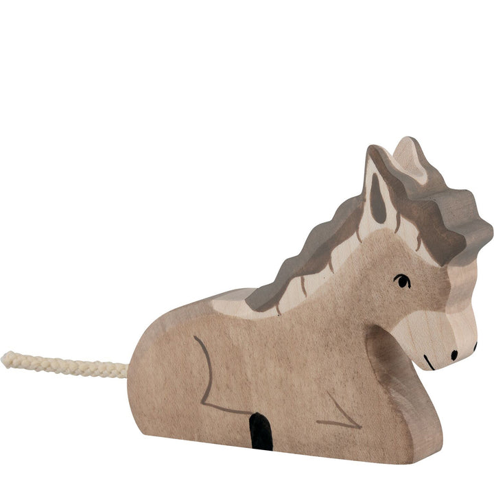 Holztiger donkey, lying