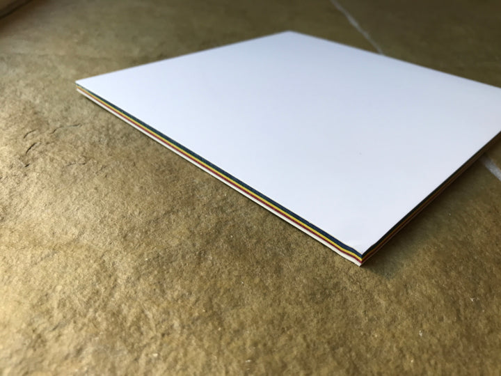 kite paper (window star transparency) Christmas colours - tiny dent in one corner