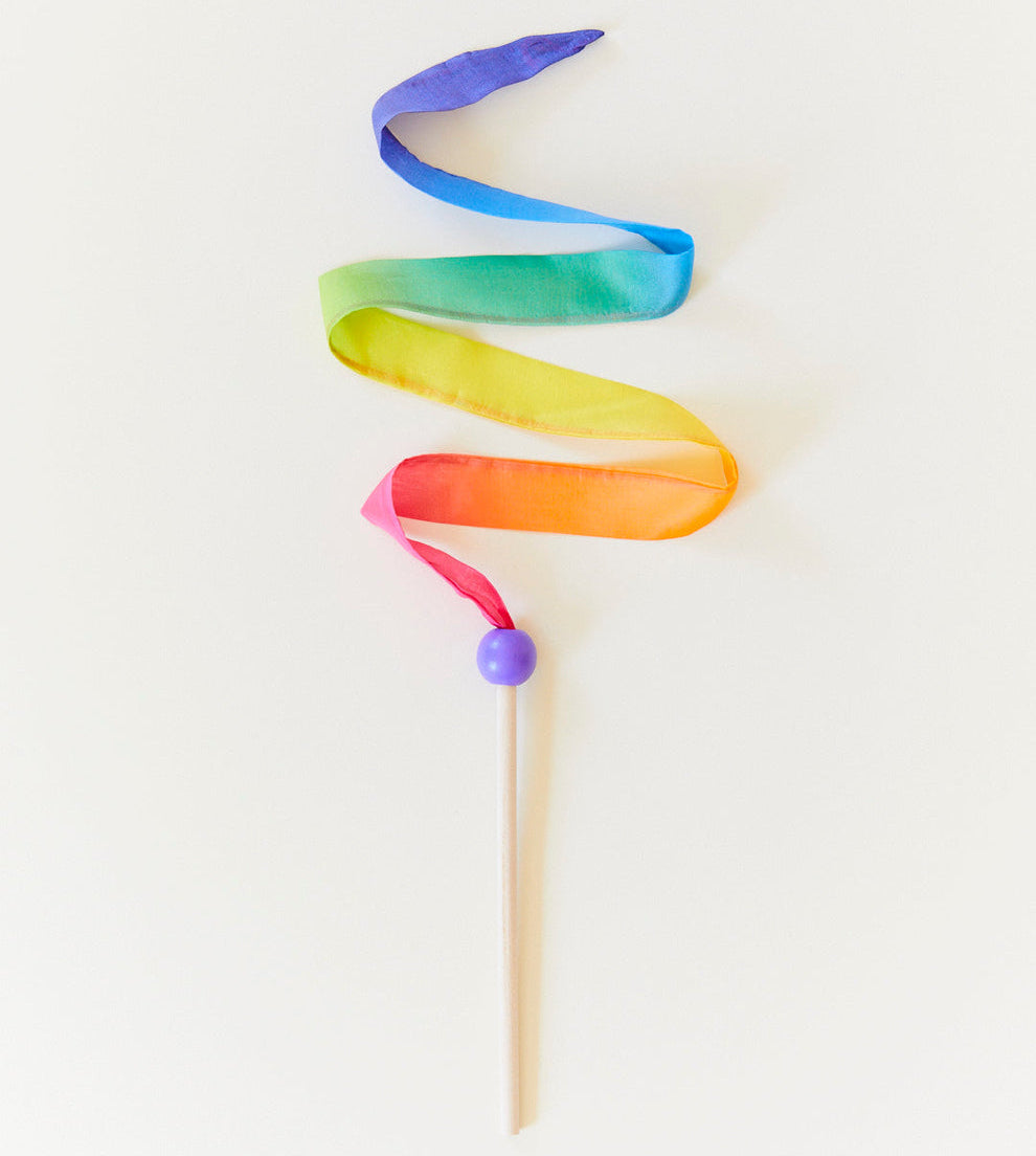 Sarah's Silks brand mini rainbow silk streamer toy on natural background
