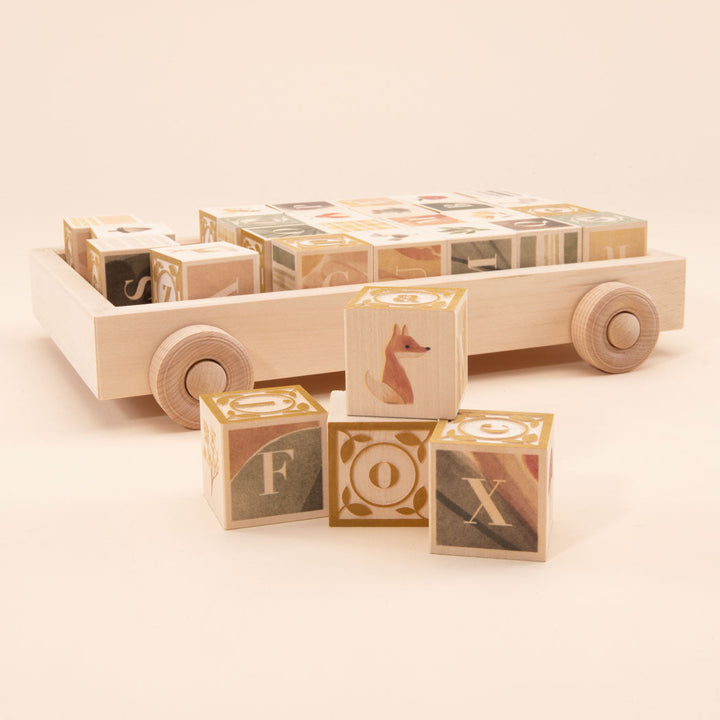 watercolour ABC blocks in a wagon