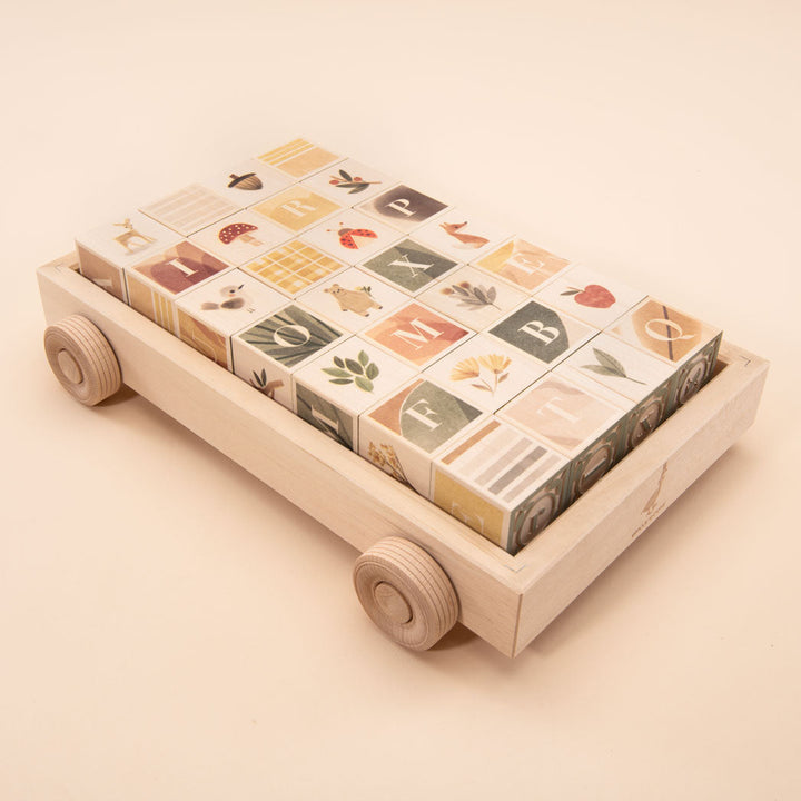 watercolour ABC blocks in a wagon