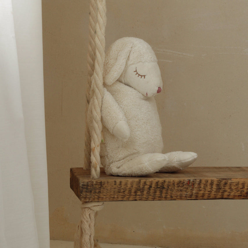 cuddly white sheep with warming inlet