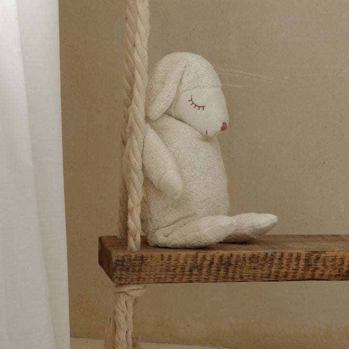 cuddly white sheep with warming inlet