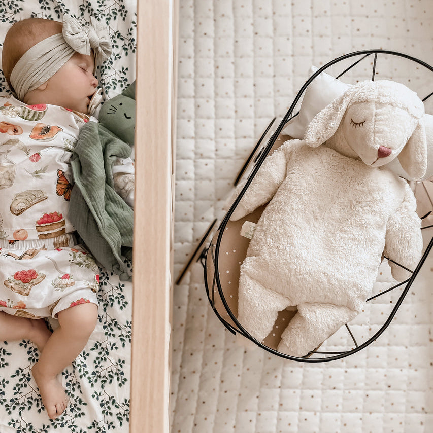 cuddly white sheep with warming inlet