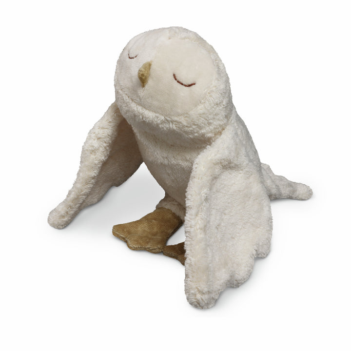 cuddly snowy owl with warming inlet