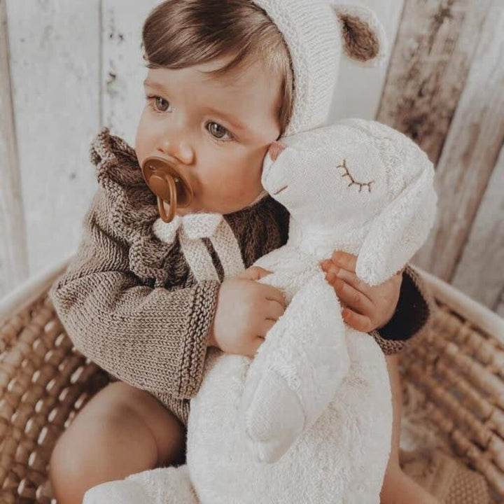 cuddly white sheep with warming inlet