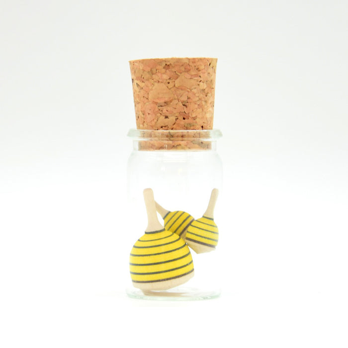 Mader swarm of bees in glass