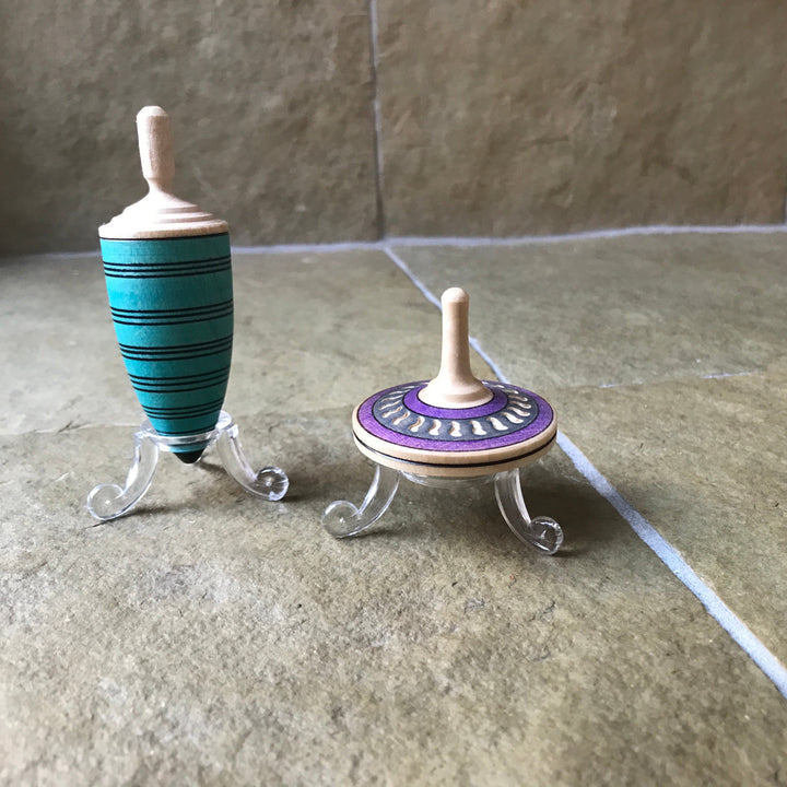 support for spinning top