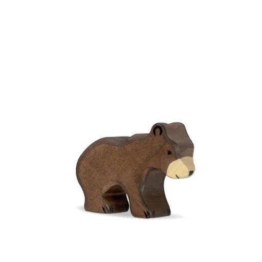 Holztiger brown bear cub
