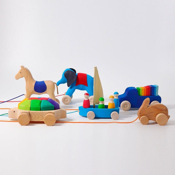large pull along elephant, blue
